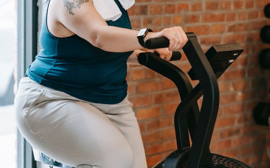 Individual on an exercise bike