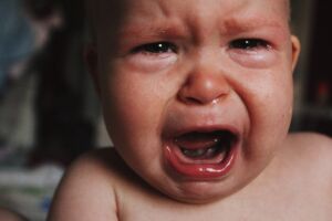 photo of a baby crying