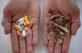 Comparison between herbs and tablets, illustrating traditional and pharmaceutical medication choices.