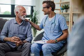 Elderly care: elderly man receiving care from a caregiver