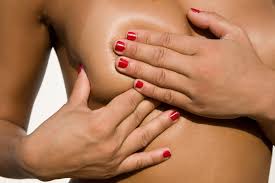 performing a breast self exam for breast health