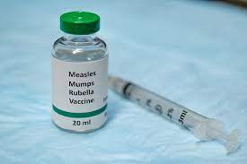 MMR vaccine vial and syringe placed together for immunization