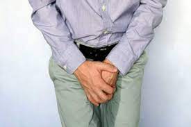 Urinary health concept: Person feeling the urge to urinate