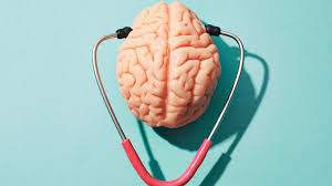 Neurological Care: An image displaying a stethoscope alongside a detailed illustration of a brain, emphasizing the connection between healthcare and brain health in commemoration of brain injury awareness month