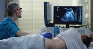 Image of patient receiving an ultrasound scan of the urinary tract