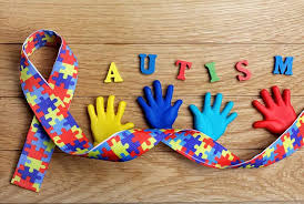 Multicolored building block awareness ribbons, symbolizing diversity and acceptance for Autism Spectrum Disorder (ASD).