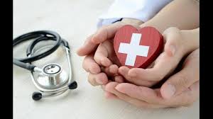 A symbolic image of a heart cradled in the hands of a child and an adult, emphasizing the nurturing protection and security provided by health insurance.