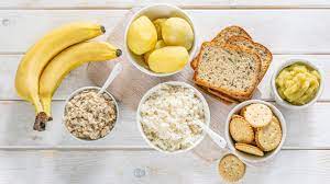 Bland foods ideal for diarrhea: plain rice, boiled potatoes, toast, bananas, and applesauce