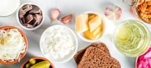 Probiotics: yogurt, kefir, kimchi, and sauerkraut can help restore gut health.
