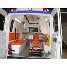 Interior of ambulance showing stretcher, medical equipment, and seating