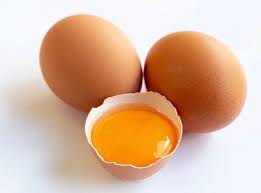 Eggs and egg yolks on display: A rich source of nutrients for a balanced diet.