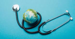 Healthy globe under the watchful care of a stethoscope, representing global well-being and healthcare for a healthier world.