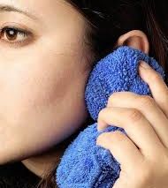 Warm, Damp Washcloth: Soothing Relief for Ear ache