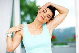 Female performing calming neck stretches and exercises