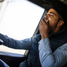 Yawning Man Driving - Fatigue Warning: Stay Alert on the Road