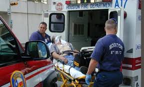 EMT transporting patient on stretcher 