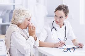 A person engaged in a health consultation discussing hay fever management.