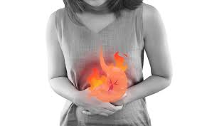 Image of flames engulfing a silhouette of a human abdomen: Severe Heartburn Sensation