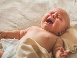Baby crying from heat loss: Visual representation of infant distress, underlining the significance of maintaining a warm and comforting environment to ensure the well-being of your little one.