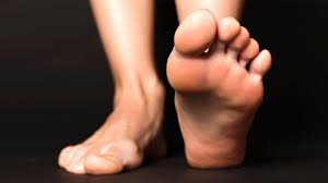 Performing foot exercises - Essential activities for promoting strength and circulation.