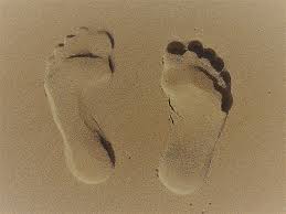 Footprints in the sand - Nurturing healthy feet through mindful care for diabetes and circulatory well-being.