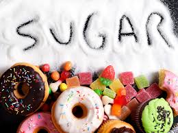 Diverse sugary products highlighting the risks associated with sugar consumption