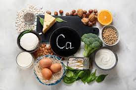 Variety of calcium rich foods on a platter - a delicious way to support bone health.