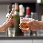 Saying No: A Person Rejecting Alcohol for Responsible Living.