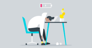 Exhausted person sitting at a desk with burnout - Empty battery symbolizing burnout, chronic fatigue and stress