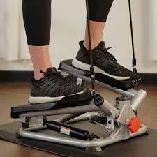 Woman using an exercise machine, highlighting the importance of physical activity 