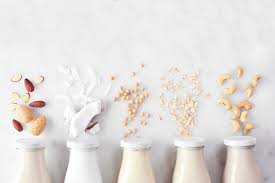 Close-up of fortified soy, almond, and oat milk - your delicious calcium-packed alternatives.