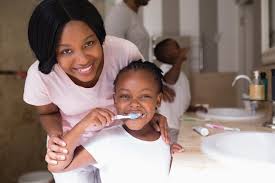 Children brushing together - Instilling good dental habits from a young age.