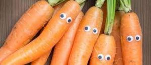 A bunch of fresh carrots highlighting their role in promoting eye health.