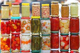 A colorful array of assorted pickles and fermented foods, showcasing their rich probiotic content 