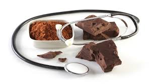 Stethoscope beside dark chocolate: Balancing health and treat