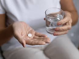 A close-up image of aspirin tablets, symbolizing effective pain management and relief from inflammation. 