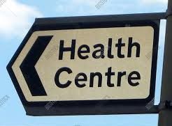 Health centre sign on building exterior